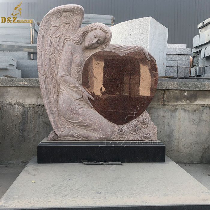 Hand carved angel holding granite heart tombstone DZM-1312